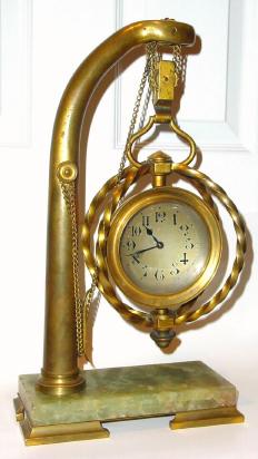C.1880, French, Dock Theme Industrial series clock, a davit with chain drive blocks and pulleys, the hoist holding a large carriage in which is mounted an 8-day timepiece. — Antique Clocks Price Guide