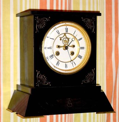 C.1905, French, Egyptian Revival, black marble mantel clock, incised with winged insect on base. — Antique Clocks Price Guide