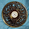 C.1920, German, Unsigned, Round Cast Brass novelty strut clock with 30 hour rear wind fit up movement.