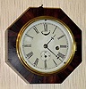C.1865, E. N. Welch, Rosewood Octagon gallery clock, lever movement, 8-day.