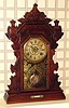 C.1893 (dated), Seth Thomas, Walnut Gingerbread clock, 8-day, time, strike and alarm, Harvard variant.
