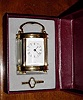 C.2002, China, New Old stock, oval carriage timepiece, miniature size, in red gift box.