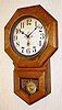 C.1915, Sessions, 8 Inch Drop, solid oak octagon drop timepiece.