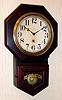 C.1920, Sessions, 10 Inch Drop, 8-day timepiece, poplar case with mahogany finish.