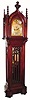 C.1900, American Case, 9-tube, 3-weight, two chime mahogany hall clock, Gothic style, for Fred Bucher and Sons, Baltimore (engraved on dial).