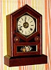 C.1875, Jerome and Co. (New Haven Clock Co.), 8-day time/strike/alarm shelf clock.