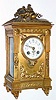 C.1890, French for Tiffany and Co., New York, gilt bronze ladies desk clock with guilloche side panels depicting ladies in gowns.