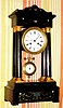 C.1860, French, Japy Fils, 4-Column Empire style mantel clock with engraved brass and enamel inlays, 8-day, bell strike.
