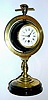 C.1880, French Industrial Timepiece, and barometer, brass finished in gilt in silver, a poising device with handle at top.