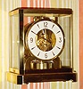 C.1965, Swiss, Le Coultre, Atmos, Never wind clock, running on changes in temperature and pressure, with original sales receipt dated 1965, from Sprang Jewelry in Los Angeles.