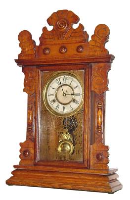 C.1900, New Haven Clock Co., "Doon", 8-day time/strike mantel clock, striking on a flat wire cathedral gong. — Antique Clocks Price Guide