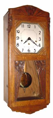 C.1910, France, ODO, 8-day time, Westminster chime, plus strike, wall clock in an oak art Deco case. — Antique Clocks Price Guide
