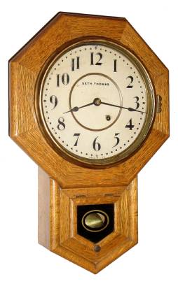C.1924, Seth Thomas Clock Co., "Drop Octagon,10 Inch", 8-day oak cased timepiece. — Antique Clocks Price Guide