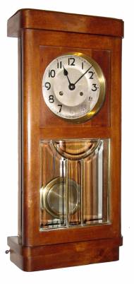C.1910, German, Unmarked Box Clock, 8-day time and strike in a light walnut case with 4 heavy panes of beveled glass in the door. — Antique Clocks Price Guide