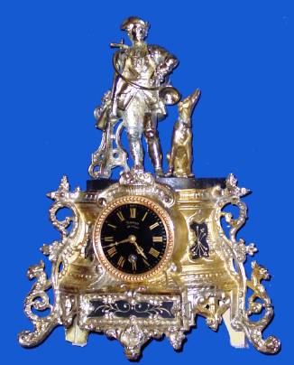 C.1890, French, Silver and Gilt over Spelter figural clock of a hunter with his horn, dog and rifle, 8-day time only. — Antique Clocks Price Guide