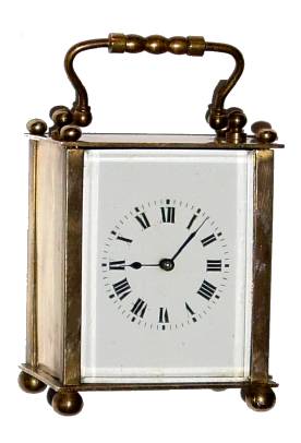 C.1930, French, Brass Cased Timepiece Carriage clock, of inexpensive quality, with glass only on the front, sheet brass to the sides and rear, with travel case. — Antique Clocks Price Guide