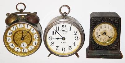 (Lot of 3), C.1904, William L. Gilbert Clock Co. and Western Clock Co., alarm timepieces with 30-hour lever movements. — Antique Clocks Price Guide