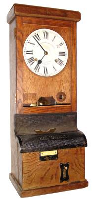 C.1920, English, National Time Recorder Co., Ltd, 8-day double spring time clock with punch-in mechanism in the base, oak case. — Antique Clocks Price Guide