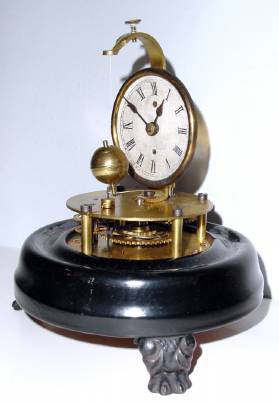 C.1870, Unsigned, but by either Geo. W, Brown or E. N. Welch, Forestville, Conn, 30 hour "Briggs Rotary" pendulum clock with glass dome. — Antique Clocks Price Guide