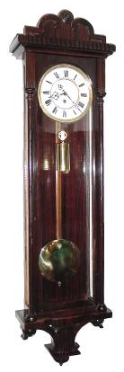 C.1860, German, Faller, Gutenbach, one weight, 8-day, Vienna Regulator, in a late Biedermeier or transitional style case with false rosewood graining. — Antique Clocks Price Guide