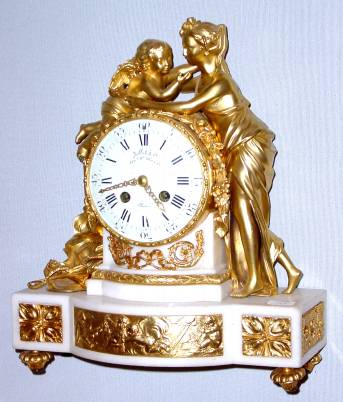 C.1875, French, Jollet and Cie, Paris, Ormolu and Marble clock, Mother and Little Angel, 8-day time and bell strike, movement by Vincenti, with 1855 Silver award medallion. — Antique Clocks Price Guide