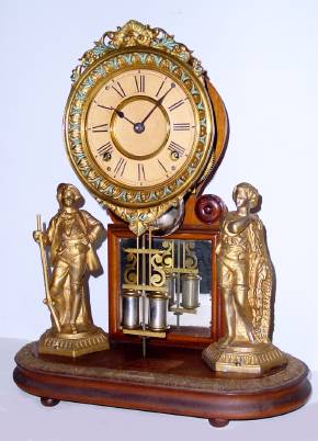 C.1880, Ansonia, CRYSTAL PALACE, No. 1, Extra, 8-day time and strike clock mounted to a walnut splat and base, with cast and gilt figures to the right and left, under a glass dome. — Antique Clocks Price Guide