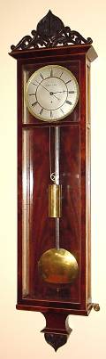 C.1835, Austrian, 6-lite Biedermeier, 30-Day, silvered dial with cast/engine turned bezel, in a crotch mahogany case with satinwood banding. — Antique Clocks Price Guide