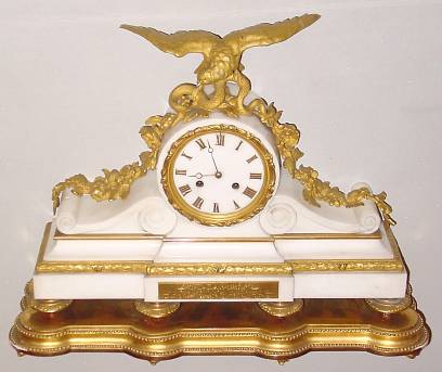 C.1861 (Dated), French, White Marble and Ormolu Figural Clock EAGLE with SNAKE, 8-Day bell strike, presentation clock with glass dome. — Antique Clocks Price Guide