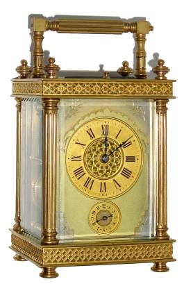 C.1900, French Brass Cased Carriage clock, in a column case with turned finials and feet, a silvered and engraved dial mask and gilt chapter rings, time, strike, repeat and alarm. — Antique Clocks Price Guide