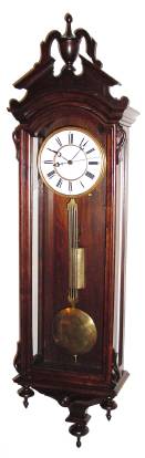 C.1875, George A. Jones, NY Wall Regulator, in a mahogany "Vienna" style case with glass sides, center seconds hand, eight day, weight driven. — Antique Clocks Price Guide