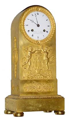 C.1825, French, Doniere and Matelin, Fabricantes de Bronzes a Paris, rounded Gothic mantel clock, ormolu with applied figures, Winged Cherubs putting Chicks back in a nest. — Antique Clocks Price Guide