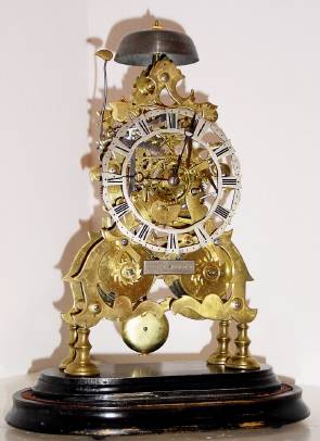 C.1870, English Skeleton Clock, 2-Chain fusee, striking the hours on a bell, 8-day with glass dome. — Antique Clocks Price Guide