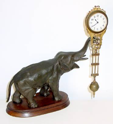 C.1910, German, Junghans, ELEPHANT, Swinging Arm Clock, 8-day. — Antique Clocks Price Guide