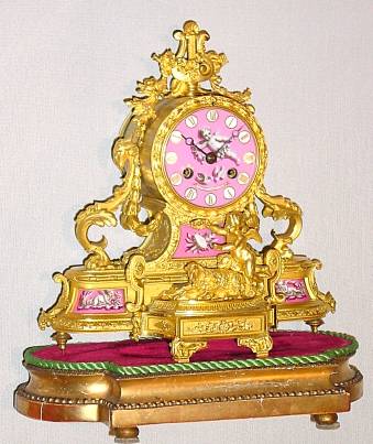 C.1890, French, Howell and James, Paris, Ormolu figural clock with pink shaded panels with paintings of cherubs. — Antique Clocks Price Guide