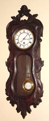 C.1890, German, Carved Case, "R-A" timepiece, 8-day, spring driven. — Antique Clocks Price Guide