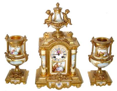C.1900, French, 3-Piece Spelter Clock Set, hand painted porcelain panels, columns and urns, gold plated finish. — Antique Clocks Price Guide