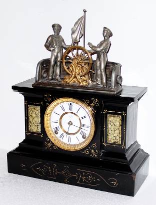 C.1895, Ansonia Clock Co., MECHANICAL CLOCK, 8-day time and strike, enameled iron case with cast metal sailors, the ships wheel rocking back and forth. — Antique Clocks Price Guide