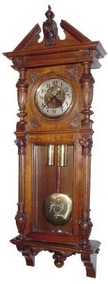 C.1885, German, Gustav Becker, 2-Wt Vienna Regulator, No. 466944, in an Alt Deutsch style case with double door design, and with Art Nouveau applique on dial center and pendulum. — Antique Clocks Price Guide
