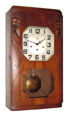 C.1920, France, Girod, Veritable, 8-day time, Westminster chime, plus strike, wall clock in a walnut art Deco case. — Antique Clocks Price Guide