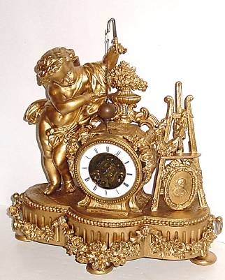 C.1890, French, Striking Conical Pendulum clock, figure of a cherub standing beside the clock, holding the pendulum in his hand. — Antique Clocks Price Guide