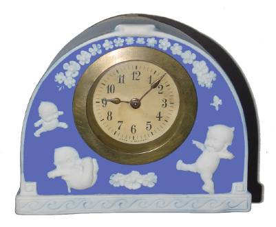 C.1910, German, Kewpie Copyrighted Jasperware, 30-hour lever movement porcelain novelty timepiece. — Antique Clocks Price Guide