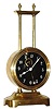 C.1921 English Gravity timepiece, the movement being driven by its own weight, and raised each day along a ratcheted upright and with exposed escapement and compound bar-bell pendulum.