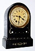 C.1870, Terry Clock Co, Waterbury, Conn, 8-day time and calendar, repainted black iron case.