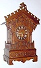 C.1920, German, G. Hettich and Sohn, Shelf Cuckoo, large, in an oak case with carved trim and a top rail, Eight Day.