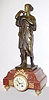 C.1900, French, Bernard Lyov, a Paris, red marble and ormolu base, with an EARLIER bronze female figure in classical robes, 8-day bell strike.