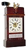 C.1870, Ansonia Brass and Copper Co., ILLUMINATED ALARM CLOCK, time and alarm in a refinished mahogany case.