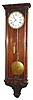 C.1830, Austrian, Biedermeier, Huygens Continuous loop wind, eight day timepiece in a slender case with profuse molded trim.