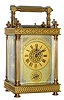 C.1900, French Brass Cased Carriage clock, in a column case with turned finials and feet, a silvered and engraved dial mask and gilt chapter rings, time, strike, repeat and alarm.