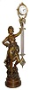 C.1885, French, Large Canister Swing Clock, a patinated spelter statue of MUSIC, holding aloft a large arm with porcelain dial, the well made movement with the imprint of Guilmet, and serial No. 1590.