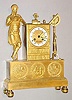 C.1820, French, Chabassol, a Paris, Ormolu FChabassoligural Clock LIBRARY, Man reading, standing beside a book case, books and instruments on top, and to the right an inclinometer.